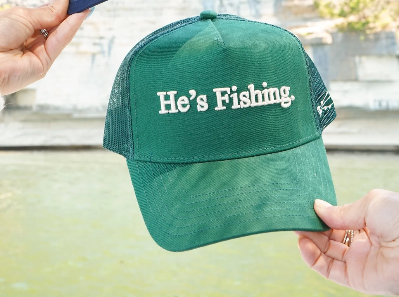 He's Fishing Trucker Hat